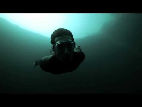 Youtube: Guillaume Nery base jumping at Dean's Blue Hole, filmed on breath hold by Julie Gautier