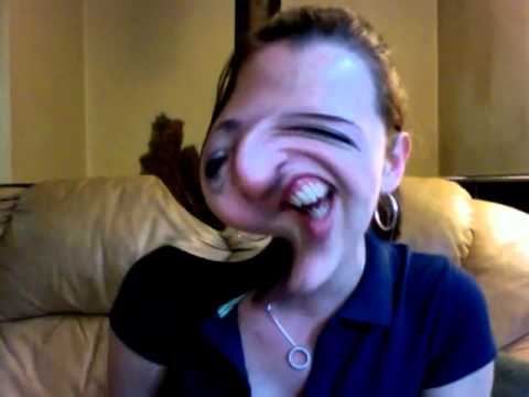 Youtube: Girl laughing while making funny faces on distorted webcam