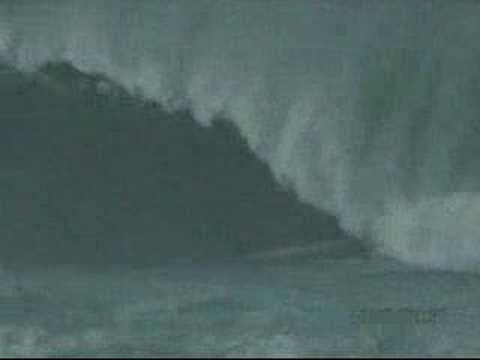 Youtube: Surfer Surfs a Tsunami ( brave or stupid you decide