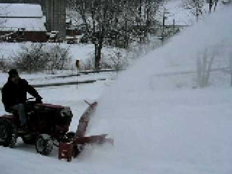 Youtube: 1992 416-8 Wheel Horse throwing snow