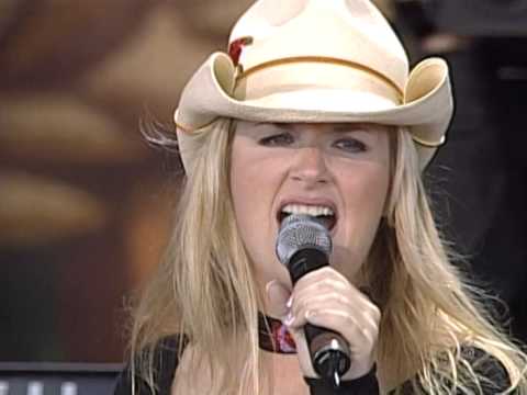 Youtube: Trisha Yearwood - She's In Love With The Boy (Live at Farm Aid 1999)